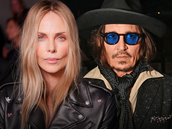 charlize theron seemingly gives cold shoulder to johnny depp at dior show 68e3b845341b5