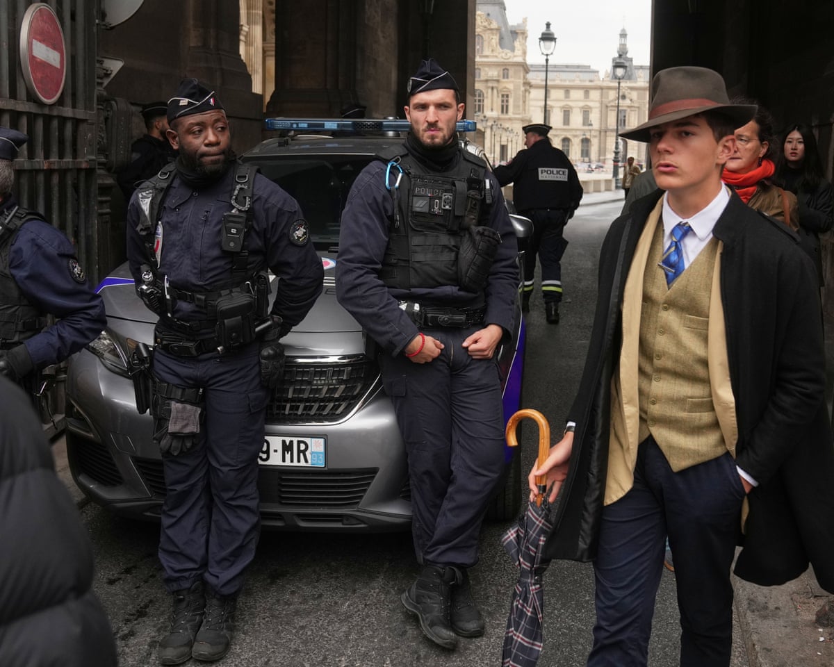 who is fedora man dapper french teenager in viral louvre heist photo unmasked 6911a47a3594b